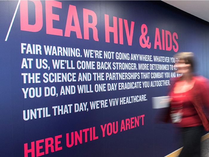 Internal wall at ViiV headquarters with message about HIV and AIDS
