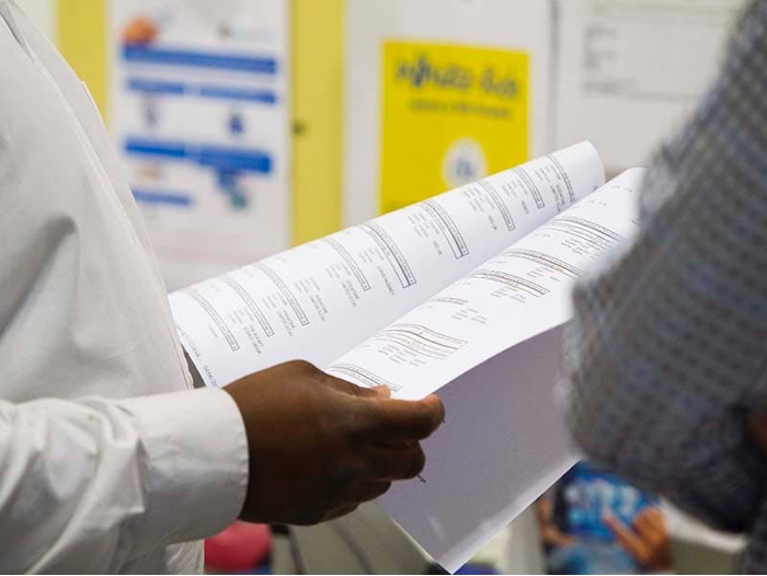 Person reading report  