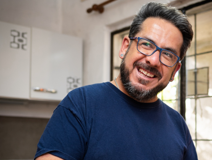 man from Uruguay living with HIV smiling and looking at the horizon