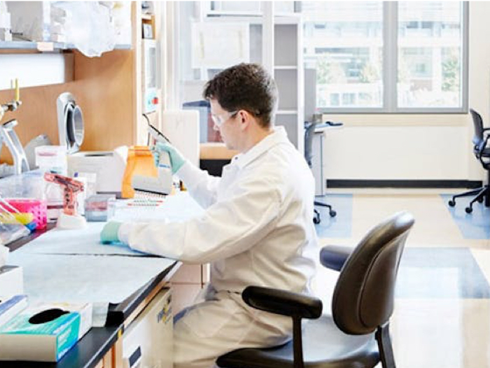 Scientist sitting in lab